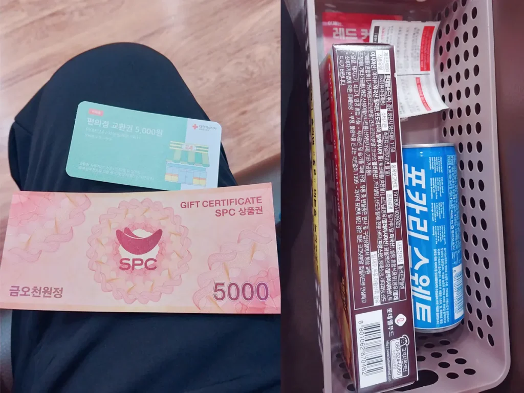 A convenience store voucher and an SPC gift certificate held in a hand next to a basket with a sports drink and snack box