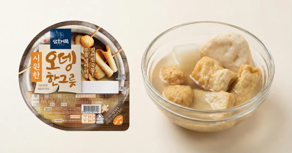 Various shapes of bouncy fish cakes in a clear bowl of mild broth next to the CJ Samho Fish Cake Cup package.